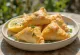Musling og fløde samosa serveret