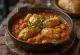 Callos med hvidløg, en rig, krydret svinekødsret