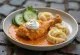 Paprikakylling med saftige kyllingestykker, serveret i paprika-creme fraiche sauce.
