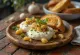 Burrata med bagte hvidløg, serveret med rosmarin