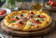 Peruviansk stil pizza med aji amarillo pasta og lokale krydderier