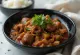 Mørk indisk ragout med svinenyrer og krydret sauce