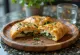 Friskbagt calzone med gedeost og spinat