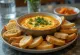 Pav bhaji fondue, serveret med revet cheddarost