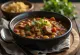 Pozole con chile pasilla serveret med lime, koriander og friske forårsløg