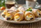 Sprøde Cannoli rør fyldt med hvid ricottacreme og pyntet med chokolade
